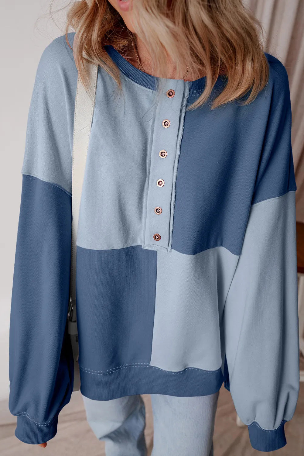 A beautiful blue Henley blouse.