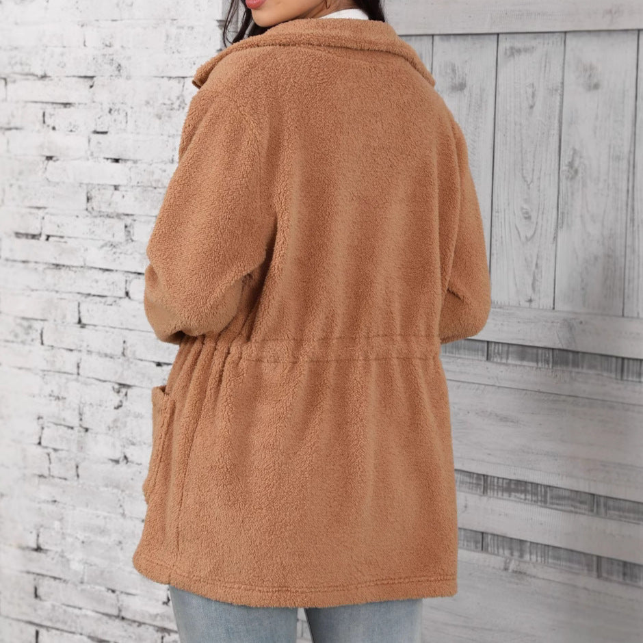 A fur-lined coat with pockets.