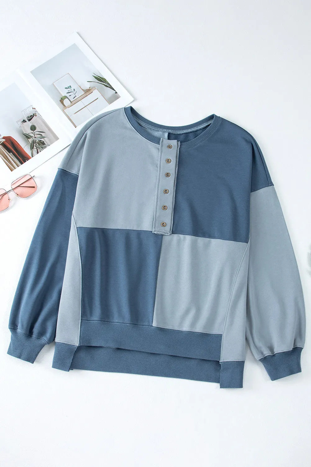 A beautiful blue Henley blouse.