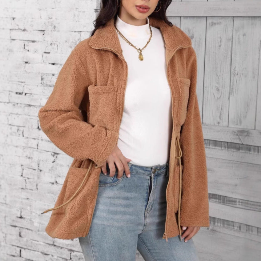 A fur-lined coat with pockets.