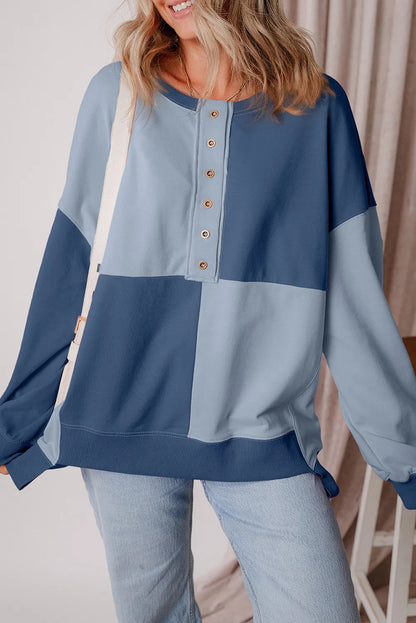 A beautiful blue Henley blouse.