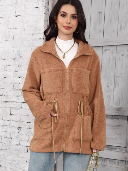 A fur-lined coat with pockets.