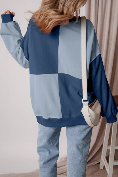 A beautiful blue Henley blouse.