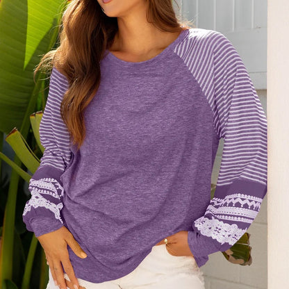 A purple blouse from Tillandsia.